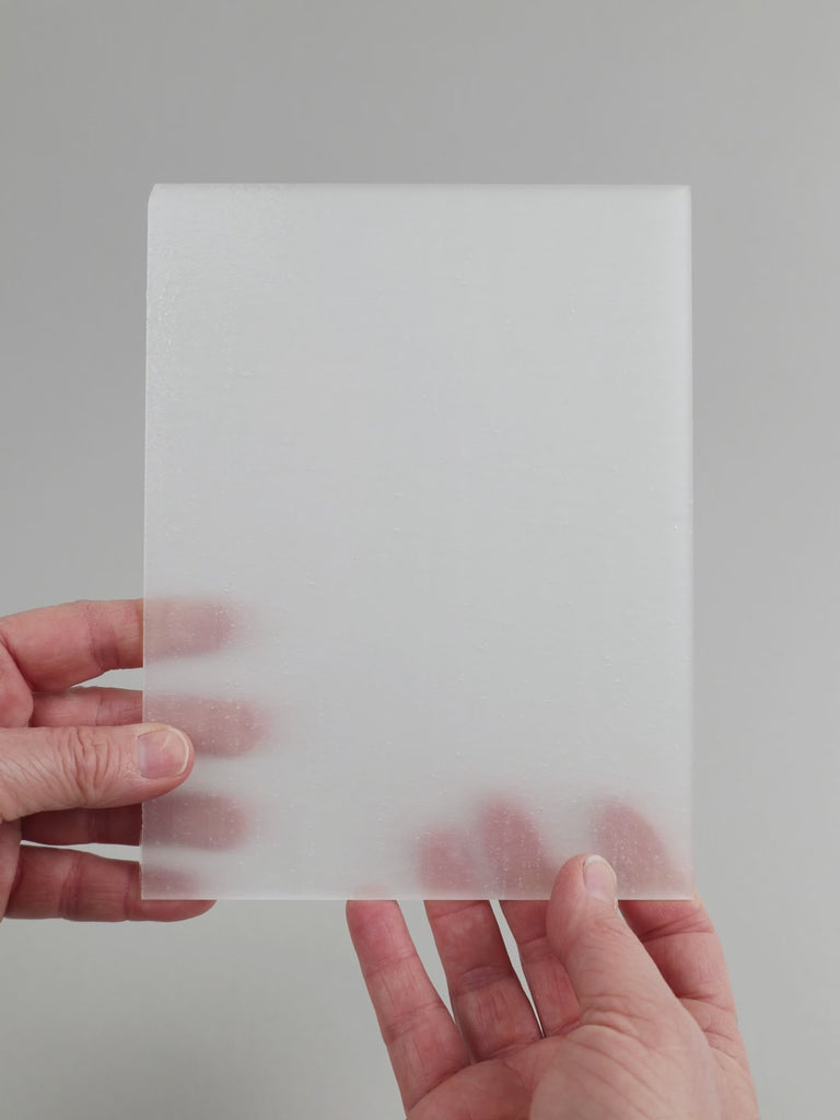 Video of the mist glass plate in White opaque, 15x19cm, held up and tilted to show its pattern and transparency